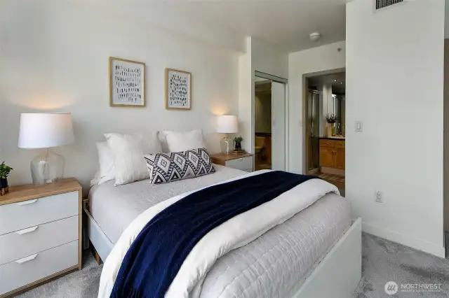 Primary bedroom with good closet space and an attached bath.