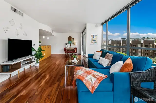 There is also a large space for a dining room. This dining space could host a large dinner party, or a great game night.