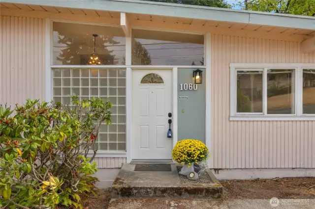 Welcome home - centrally located within steps from retail centers, trails and amenities.
