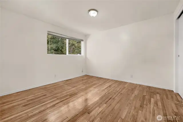 A wood burning fireplace and natural views of nature.