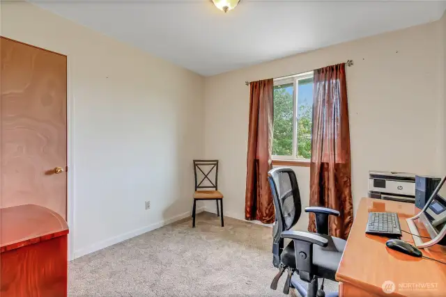 Additional (2nd) bedroom with brand-new carpeting, a large closet, and versatile space—ideal for guests, a home office, or a hobby room.