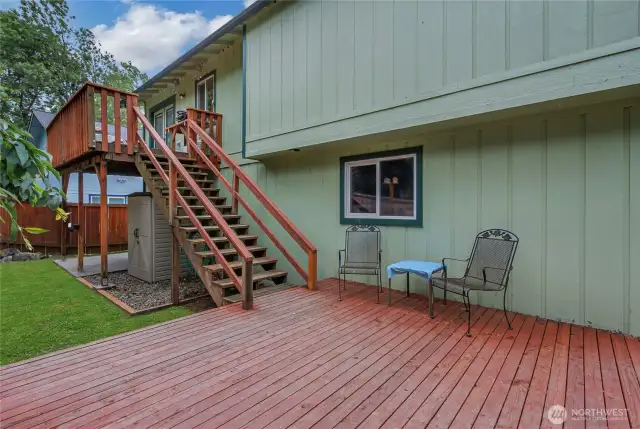 Expansive multi-level deck offers the perfect setting for outdoor living and entertaining. With plenty of space for dining, lounging, and enjoying the view, this versatile area seamlessly extends your living space into the open air.