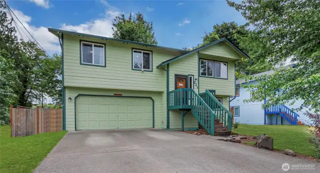Welcome to your charming home in a welcoming neighborhood. Beautiful landscaping and a warm entry make this house feel like home from the moment you arrive.