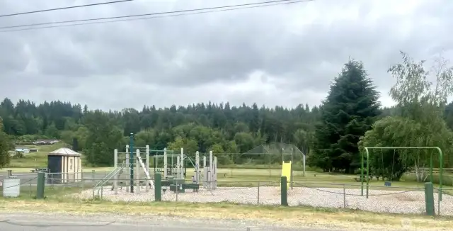 Just a short walk away, this city park features a ball field, play area, perimeter walking trails, and picnic tables—perfect for outdoor fun, exercise, or relaxing in the fresh air.