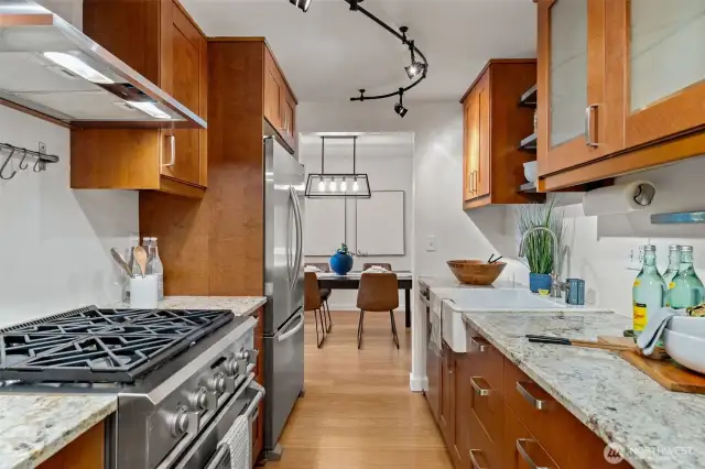 It's a narrow kitchen, but well laid out. There is so much storage!