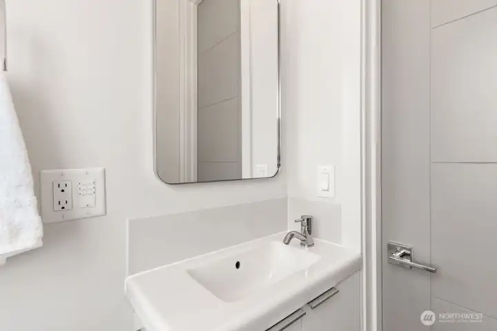 3rd Floor half bath-Picture is of similar staged unit-