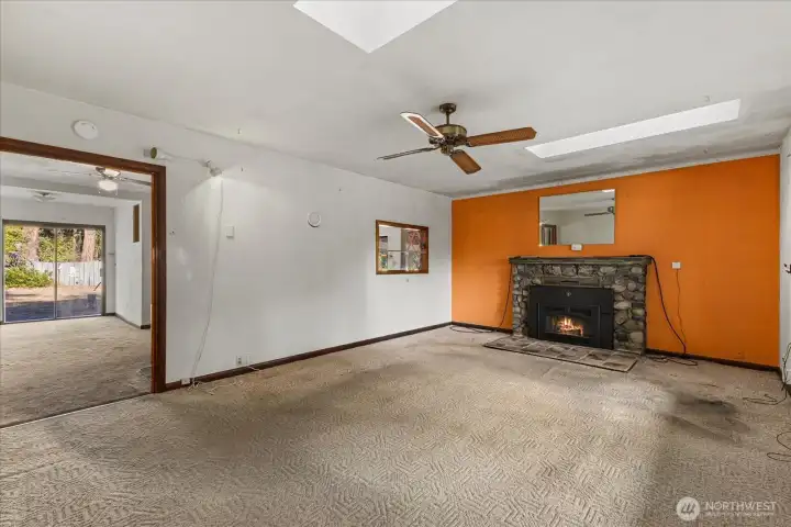 Gas powered fireplace in living room off the dining area.