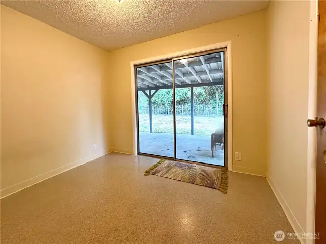 2nd bedroom leads out to patio.