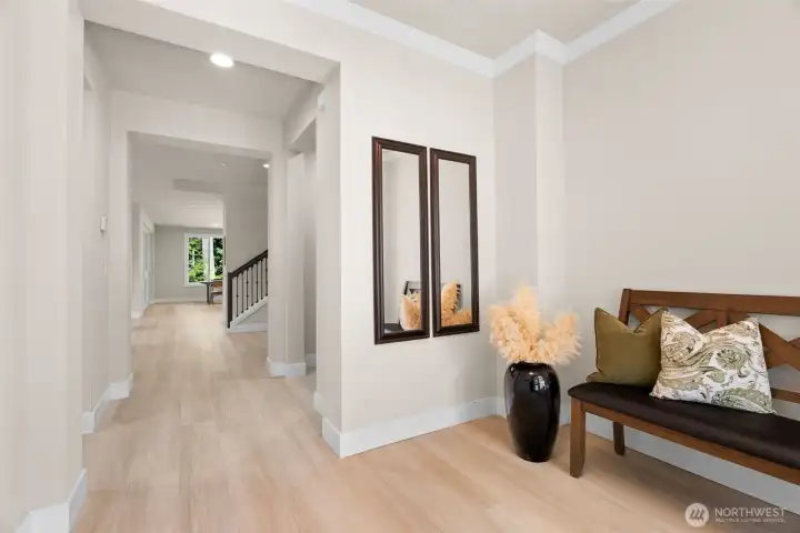 The floorplan has so much to offer!  With a main floor primary suite and office/bedroom on the main floor together with the laundry, it provides the flexibility for entirely main floor living, and loads of space for guests or your hobbys both up and down.