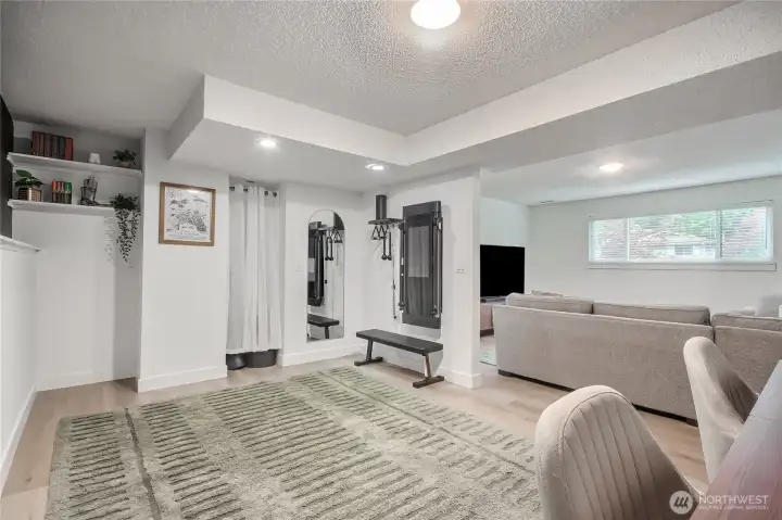 Massive downstairs area with an additional room that can be a gym or rec room.