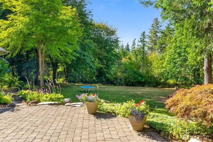 Lower patio area would make another great landing spot on a summer evening. Lots of lawn for sport, games, camp outs. Why go camping anywhere else?