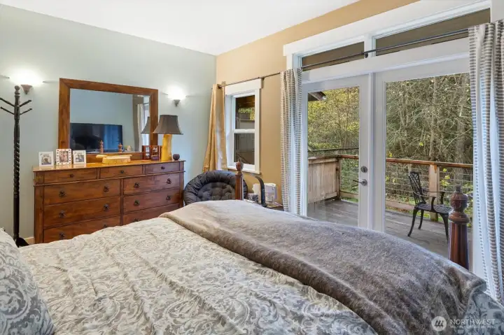 Primary bedroom with direct access to the deck