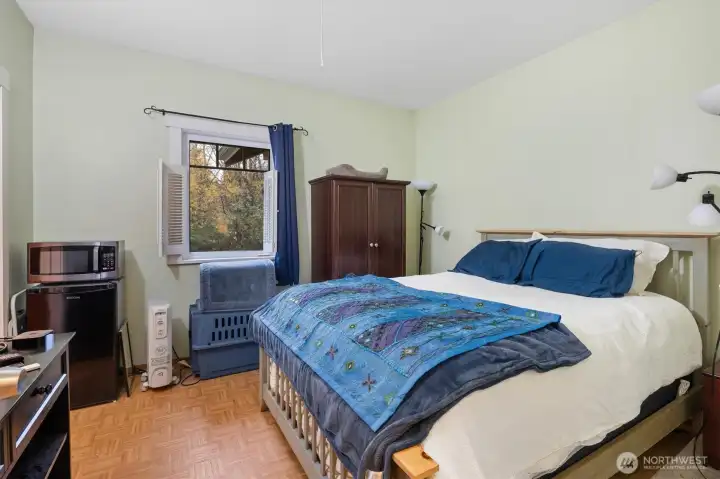 Second bedroom featuring a private ensuite