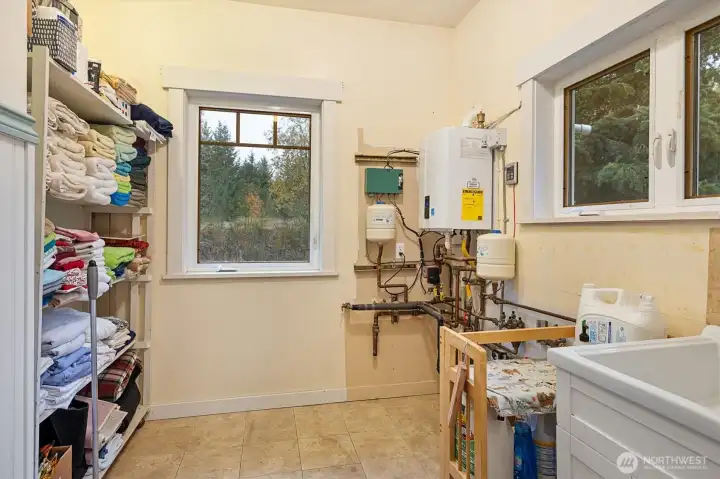 Contemporary features including on-demand hot water