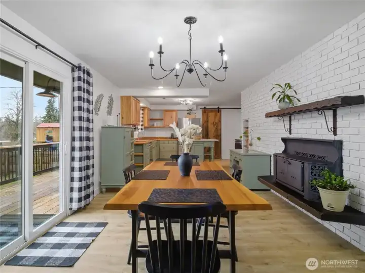 Another view of the dining and kitchen areas with the 2nd cozy fireplace.