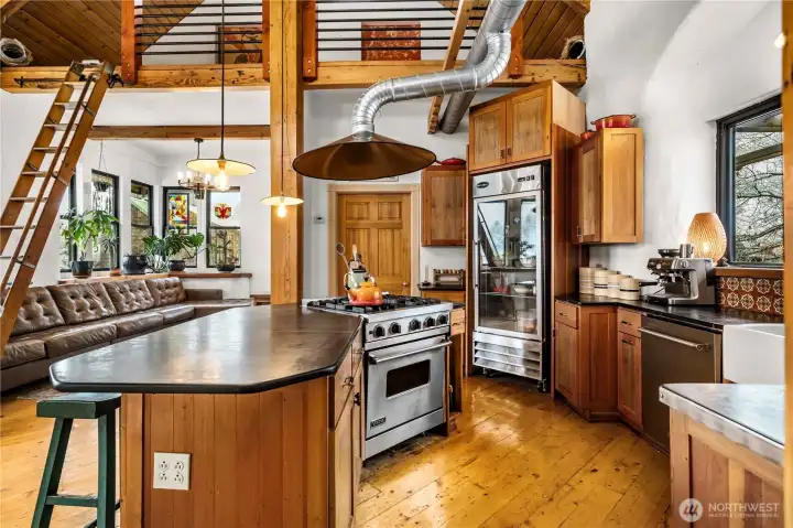 4 burner Viking range and a Saba industrial glass refrigerator