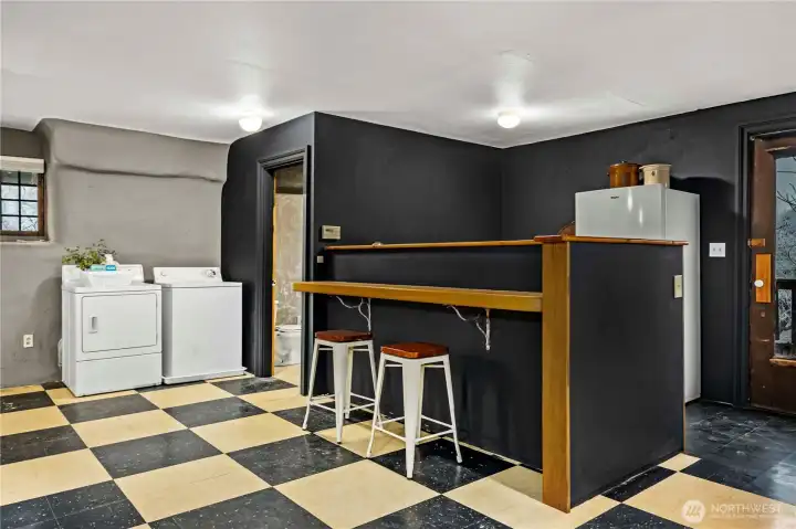 Laundry hook ups + kitchen space