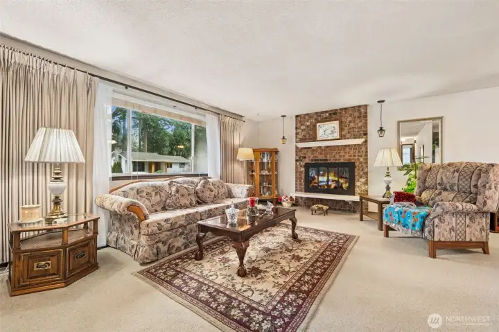 Living room with wood-burning fireplace