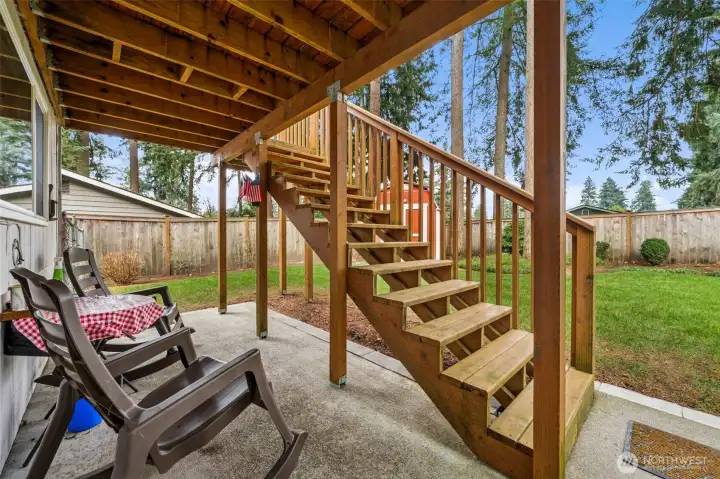Covered patio area off lower level family room