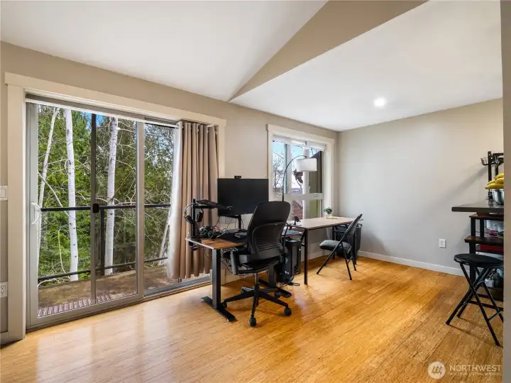 Large sliding doors take you out the balcony and storage unit.