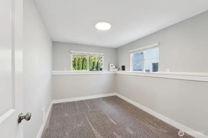 One of the two downstairs bedrooms