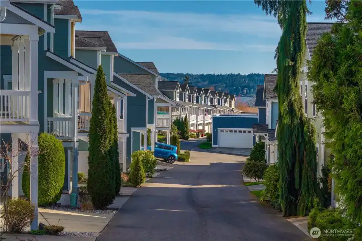 charming, walkable street connects the community to nearby shops, dining, and everyday conveniences
