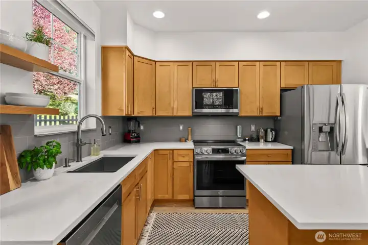 Plenty of cabinetry and generous counter space make this kitchen as functional as it is beautiful
