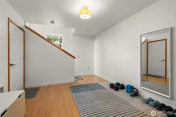 Versatile lower-level space—perfect for a home gym, office, or additional living area.