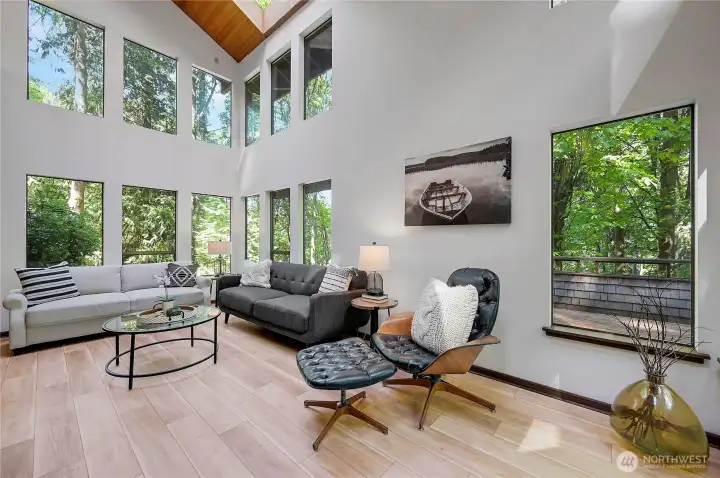 Living room with 3 story vaulted ceiling