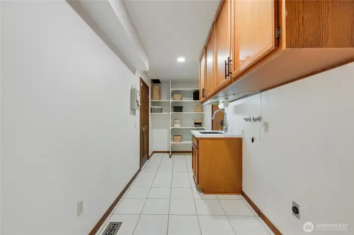 Laundry room with laundry shoot from bedroom level