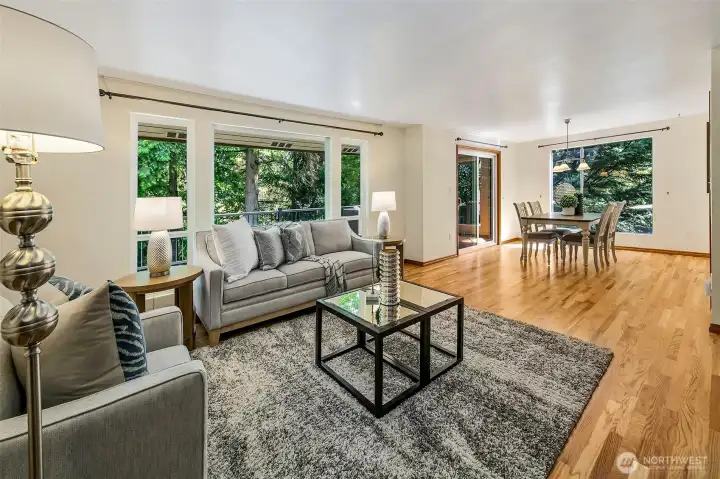 Large picture windows bring the sylvan setting in.