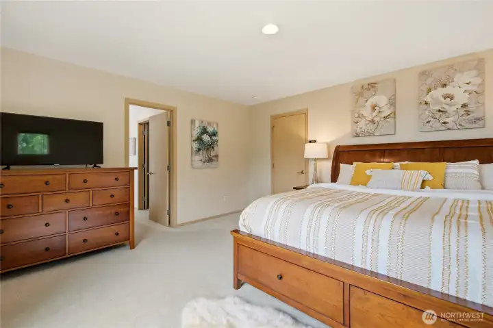 Light-filled primary bedroom with generous space Light-filled primary bedroom with generous space
