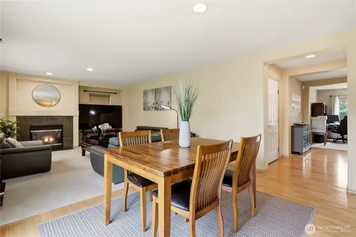Open dining area with easy flow to the great room and sliding glass doors leading to the private backyard. Open dining area with easy flow to the great room and sliding glass doors leading to the private backyard.