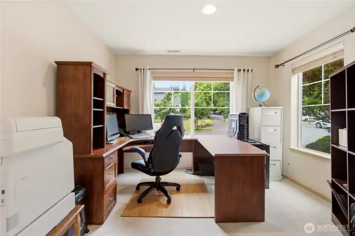 Office with window views to front yard. Office with window views to front yard.