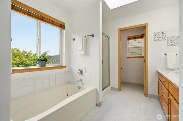The skylight and window bring in a lot of natural light, and the layout feels spacious. The skylight and window bring in a lot of natural light, and the layout feels spacious.