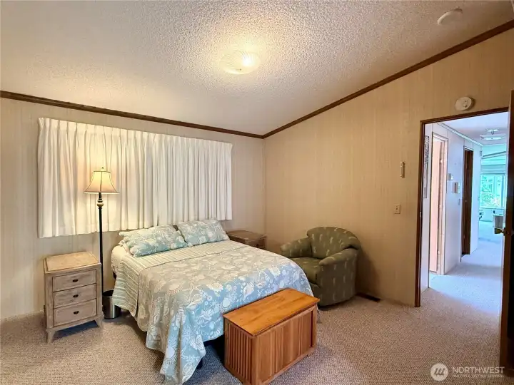 Another view of the primary bedroom.