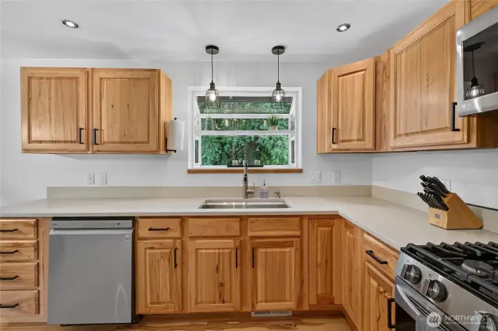 New Quartz Countertops with a Garden Window New Quartz Countertops with a Garden Window