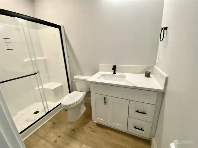 Photo of previous build and not of home currently under construction. Primary Bath