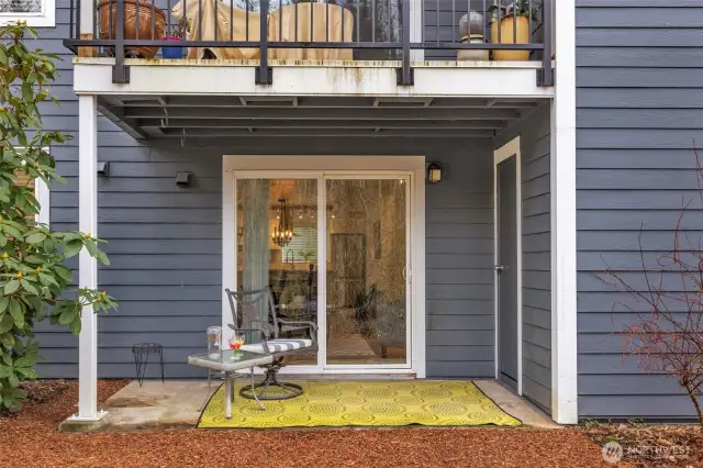 Covered Patio great for all seasons.  Walk out to the grassy area in summer.