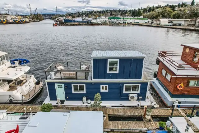 Houseboat is surrounded with large picture windows and have spectacular views.