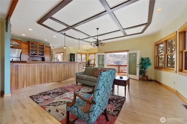 Great room with french doors opening to the deck
