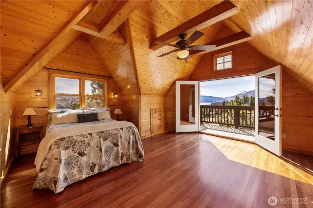 Primary bedroom with french doors to deck