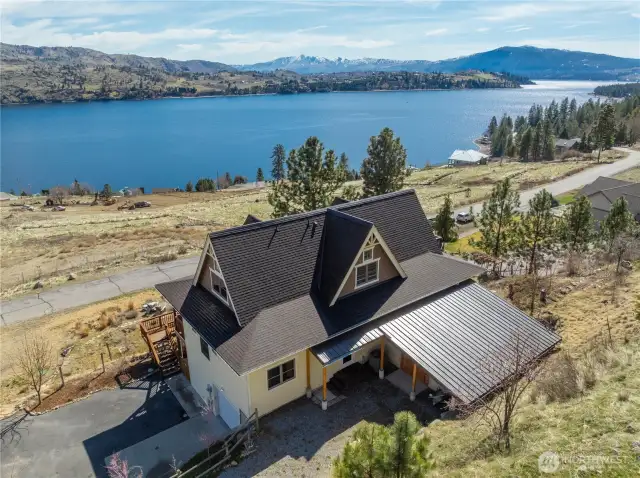 Corner lot with sweeping views of the lake