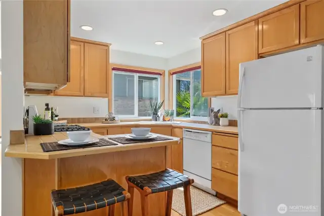 Beautiful kitchen with windows facing south and west.  Light and bright!