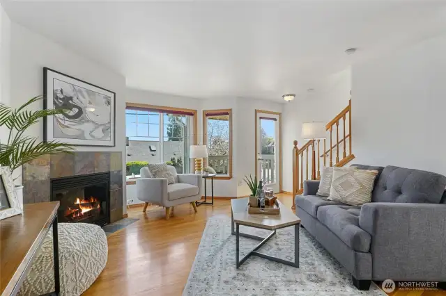 The main floor has hardwood floors and lots of natural light from three directions.  The gas fireplace was recently serviced.  New paint throughout.  Watch the sunrise over the Cascades from the front deck.