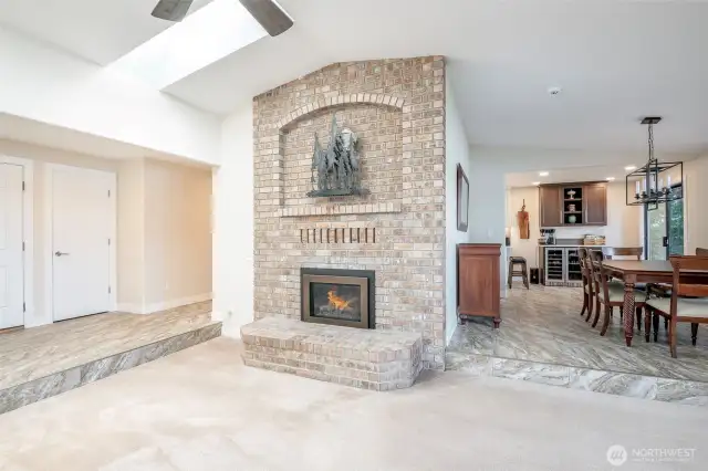 Family room and dining room steps from kitchen all with views of the lake