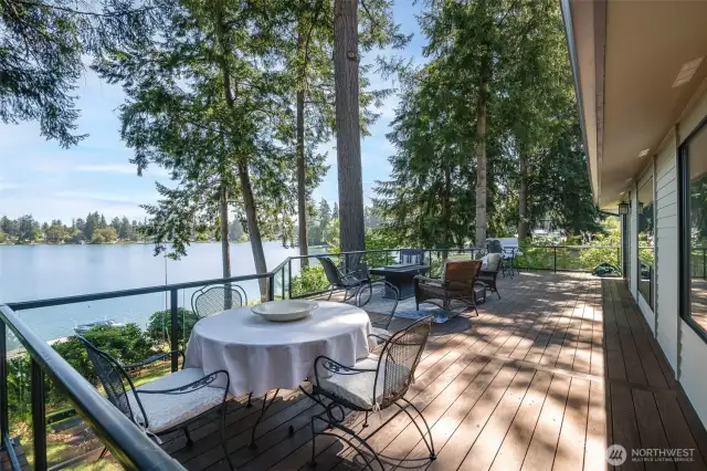 Rear deck and beautiful views of the lake and ample room for entertaining