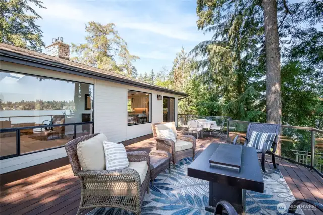 Rear of house on deck level, large view windows, from inside takes in the views of the lake