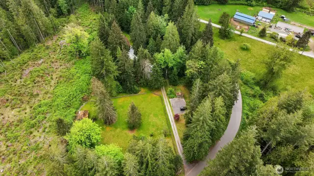 Hidden in the trees and surrounded by the Pilchuck Tree Farm this property is super private