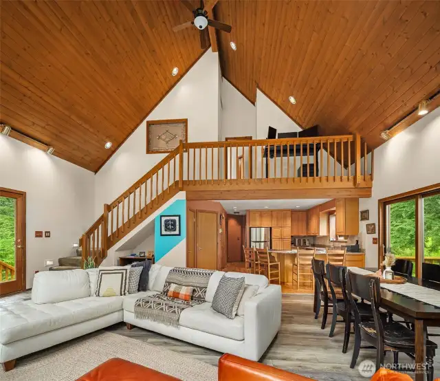 View of the loft showcasing the open concept kitchen/living/dining